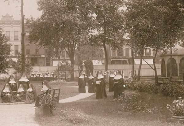 Sisters in front of their temporary quarters on 28th and Wabash