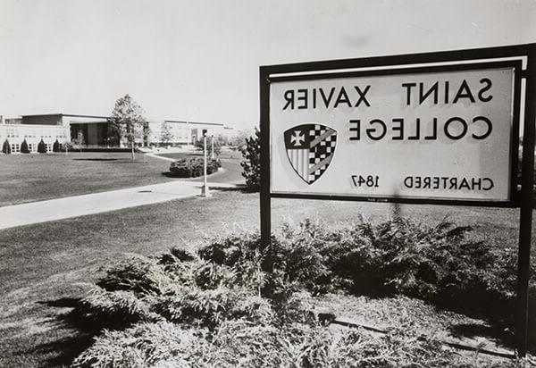 Saint Xavier College first sign on 103rd and Hamlin